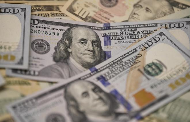 Dollar Mỹ chịu áp lực giảm trước các dữ liệu kinh tế và mùa báo cáo thu nhập của các công ty Mỹ