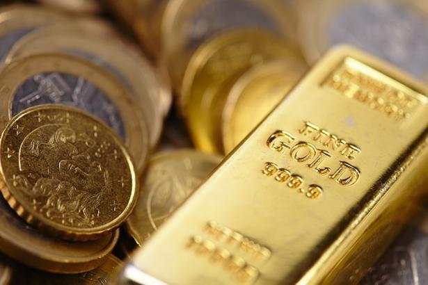Vàng có thể được hưởng lợi nhờ trợ giúp từ chính sách tiền tệ của  FED và ECB vào dịp cuối năm 