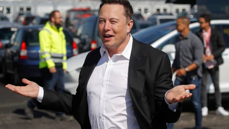 Tesla CEO Elon Musk gestures as he arrives to visit the construction site of the future US electric car giant Tesla, on September 03, 2020 in Gruenheide near Berlin.