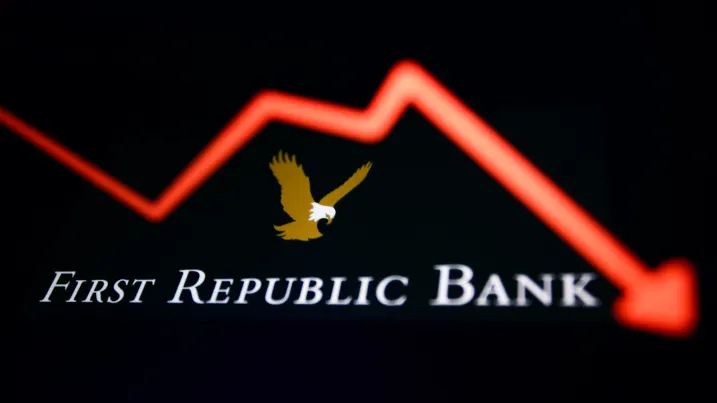 An illustrative stock chart and First Republic Bank logo displayed on a phone screen are seen in this multiple exposure illustration photo taken in Krakow, Poland March 20, 2023. (Photo by Jakub Porzycki/NurPhoto via Getty Images)