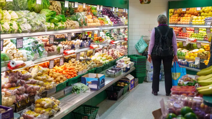 A shopper browses fruit and vegetables for sale at an indoor market in Sheffield, UK. The OECD recently predicted that the UK will experience the highest inflation among all advanced economies this year.