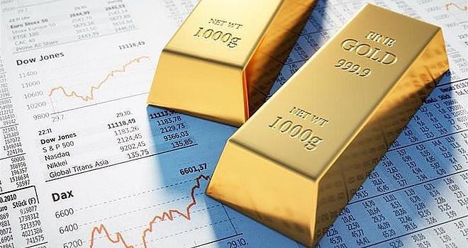 Giá vàng thế giới giảm 1% trong bối cảnh đồng USD mạnh lên | Kinh doanh |  Vietnam+ (VietnamPlus)