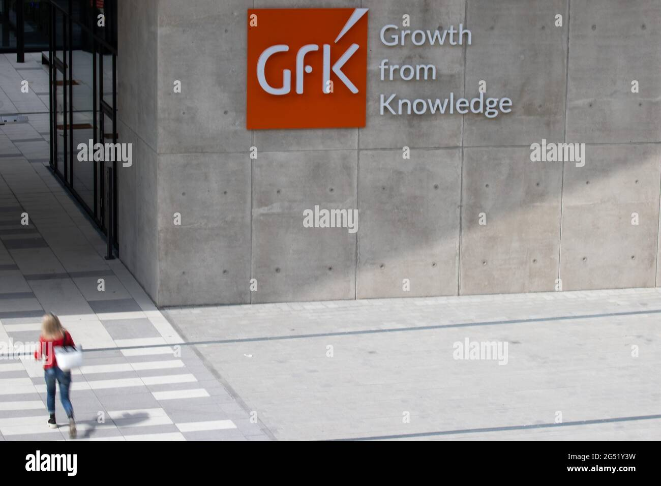 Nuremberg, Germany. 24th June, 2021. The logo of the Nuremberg-based  consumer research company GfK at the company's headquarters. GfK publishes  its latest study on consumer sentiment in Germany on June 25. Credit: