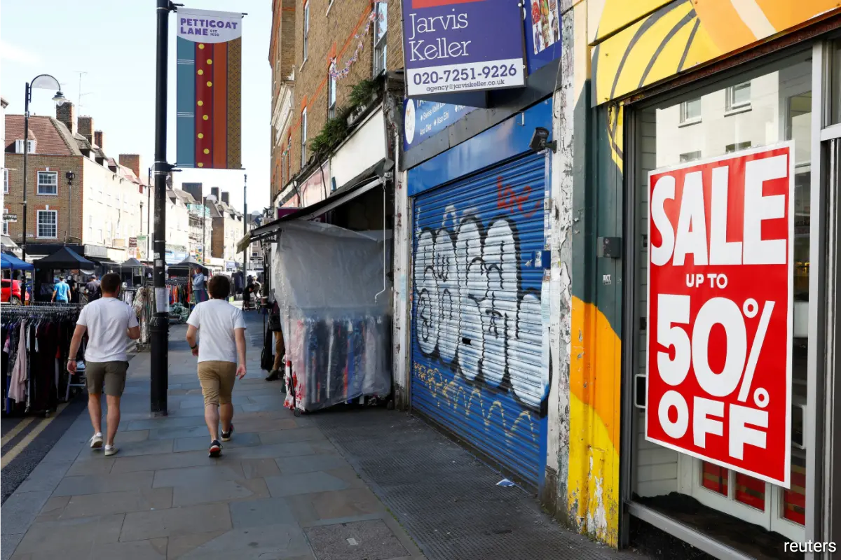 UK retailers report sales slump eased in February, CBI says